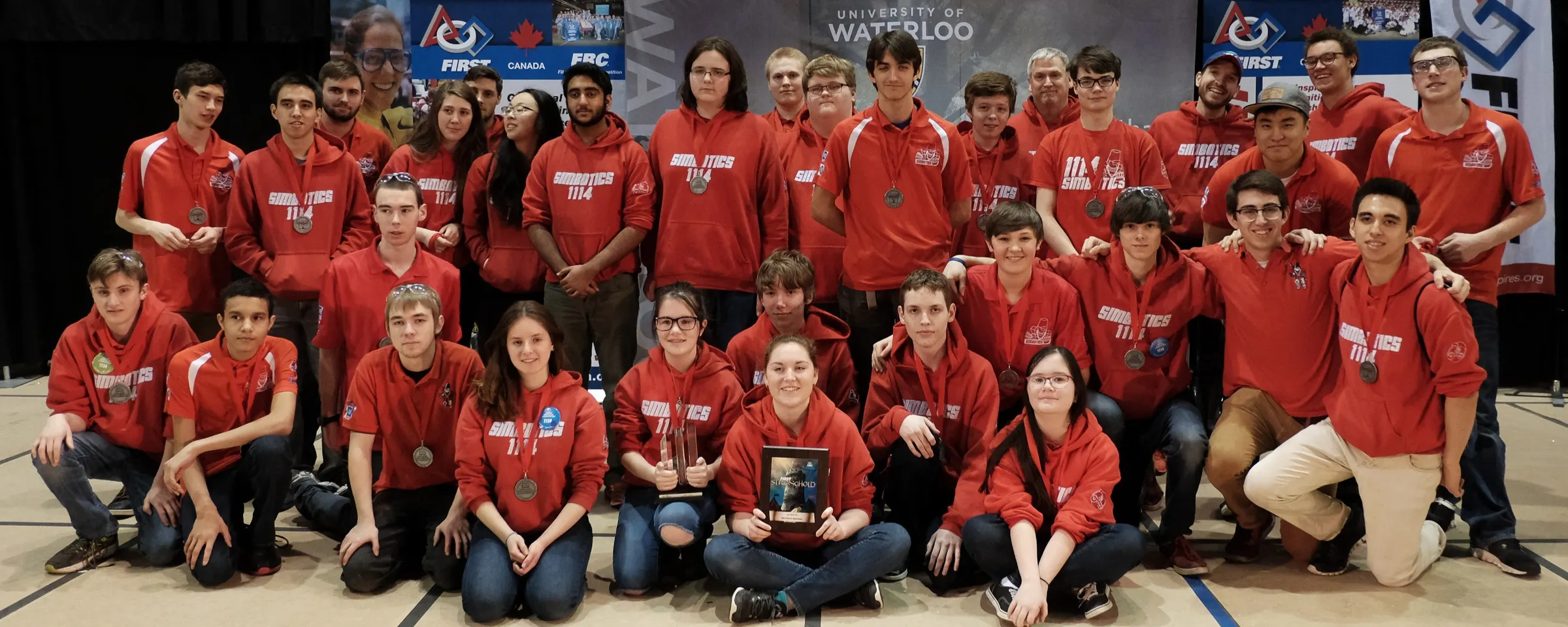Simbotics students and mentors at competition